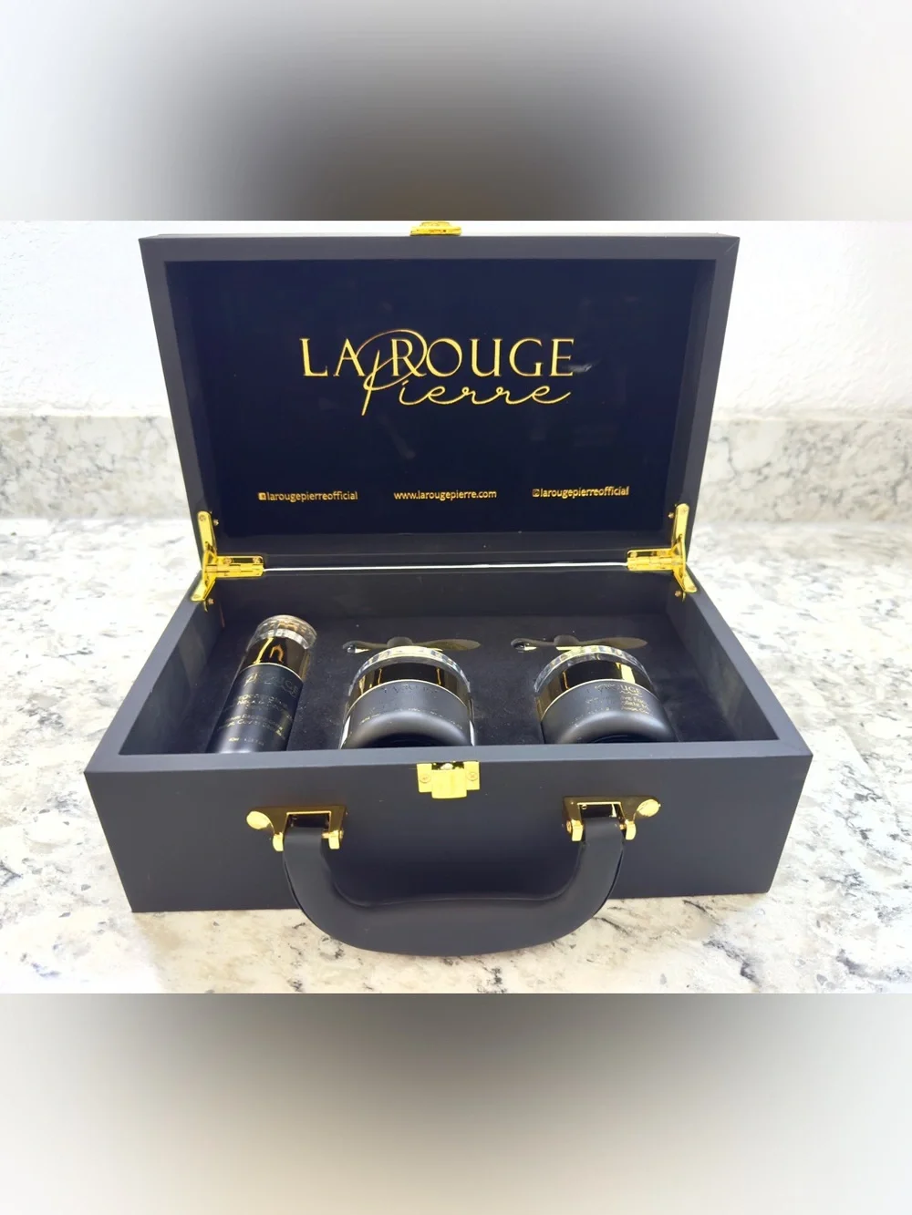 La Rouge Pierre Obsidian Collection Briefcase Skin Care Collection.